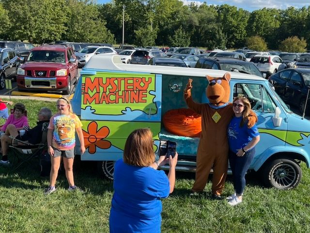 Families meeting Scooby-Doo at the VIP Carnival